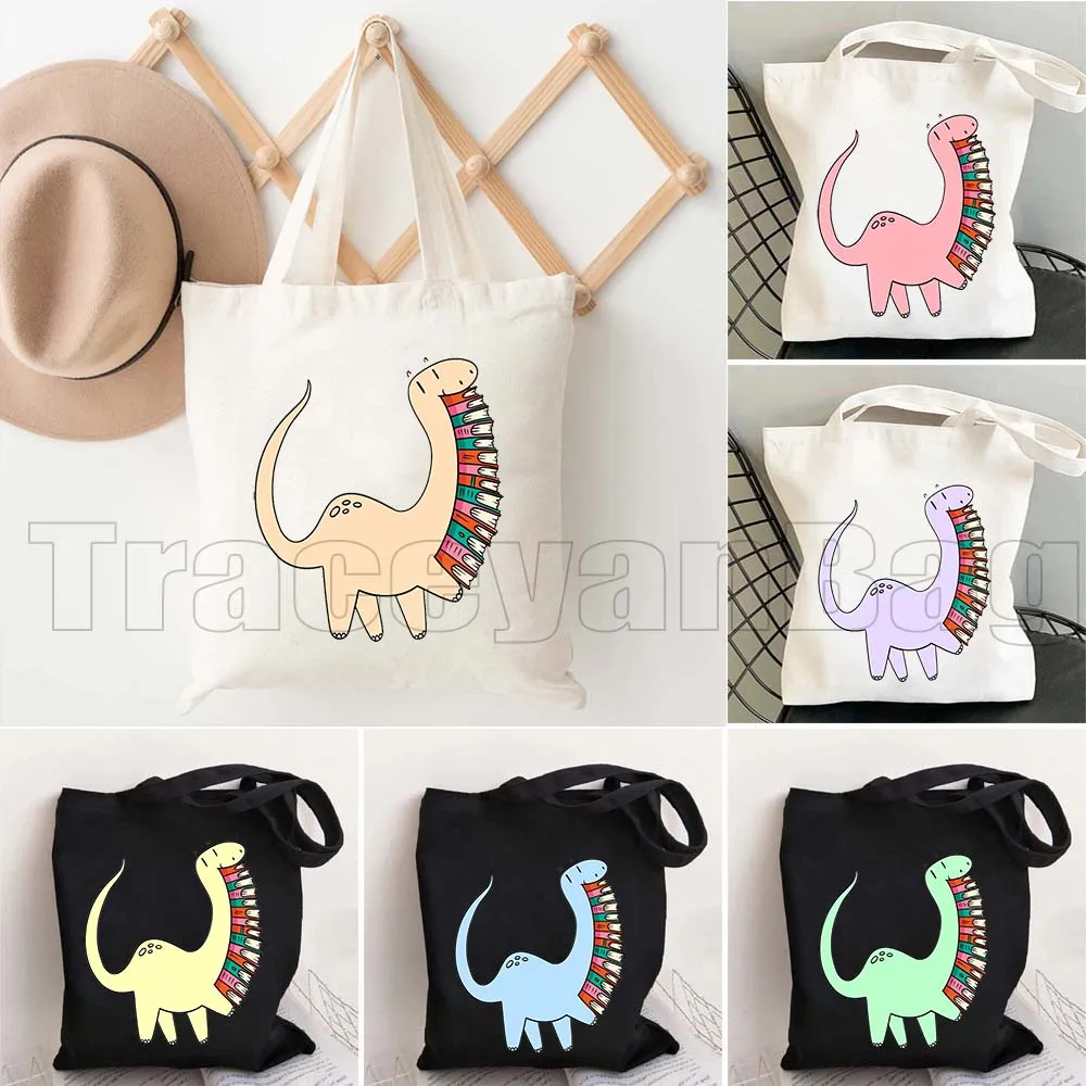 

Cute Rainbow Reading Dinosaur Pastel Pink Green Blue Purple Yellow Floral Books Booklovers Gifts Canvas Tote Bag Shopper Handbag