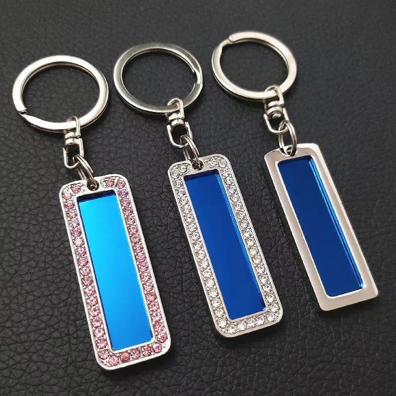 Car license key chain anti-loss pendant creative stainless steel license plate fashion pendants for men and women.