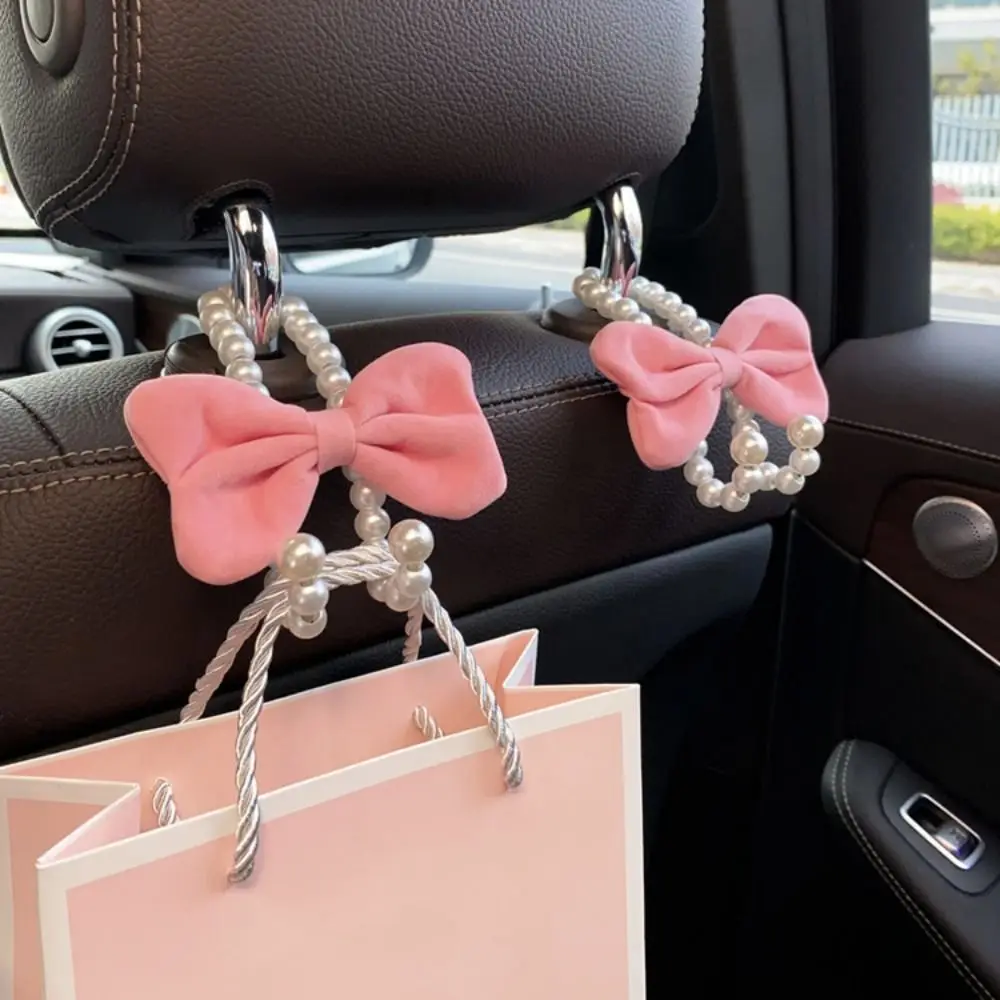 Hak samochodowy z kokardą Elegancki aluminiowy perłowy organizer samochodowy Klips do wieszania na tylnym siedzeniu samochodu Trwały, uroczy hak samochodowy z kokardą Stylizacja samochodu