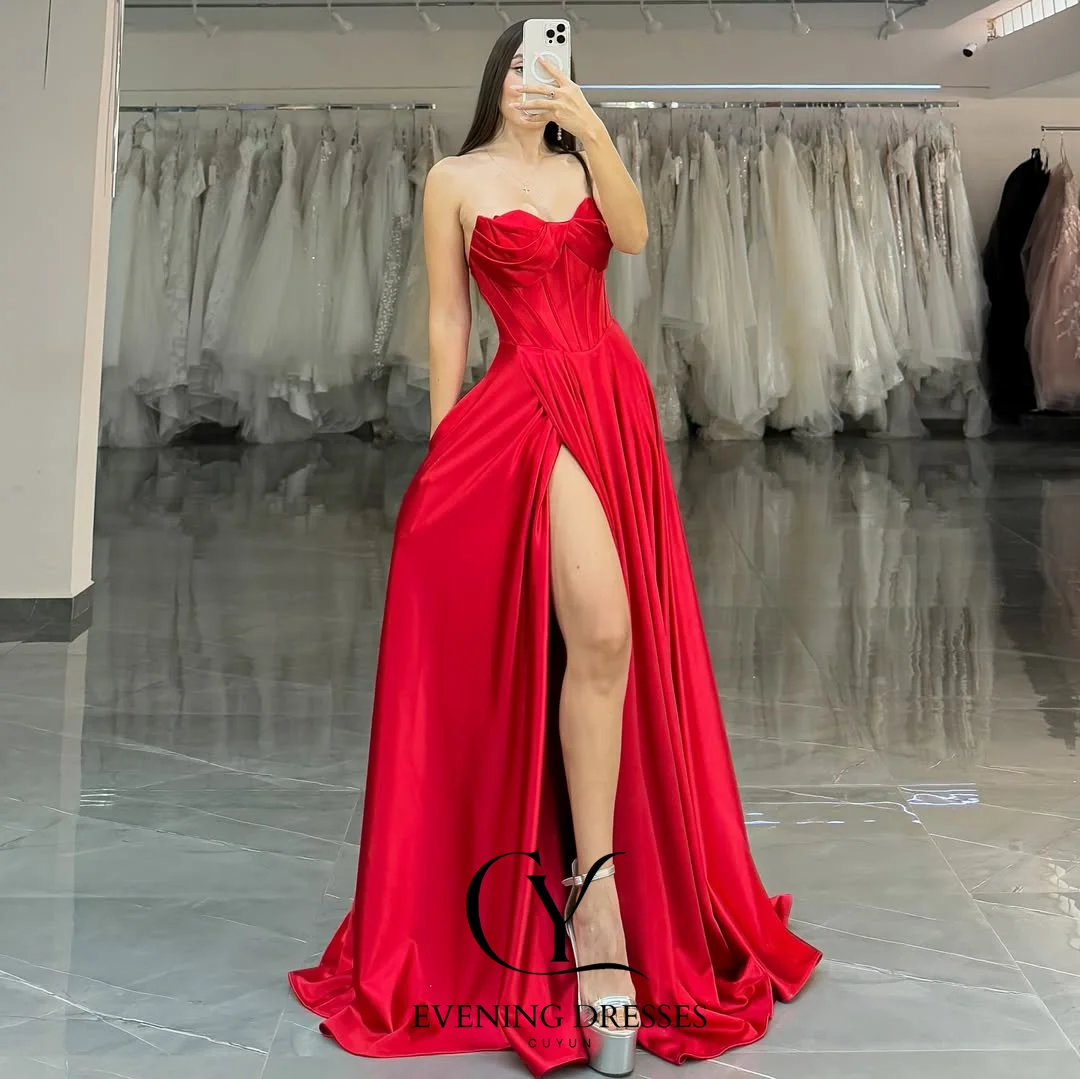 فساتين سهرة حمراء من CUYUN للنساء بدون حمالات بفتحة عالية مثيرة فستان حفلات طويل مشد خلفي مخصص للحفلات للمناسبات الخاصة