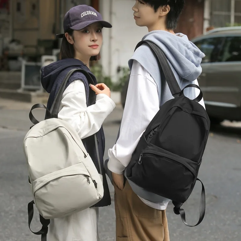 

Female 2024 version couple's new large capacity solid color backpack trendy for elementary, middle, and high school