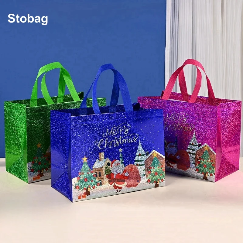 StoBag 25pcs Wholesale Merry Christmas Laser Non-woven Gift Tote Bags Packaging Fabric Waterproof Storage Reusable Large Pouch