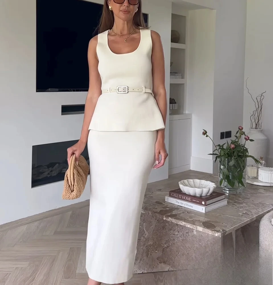 

KONDALA Элегантный вязаный комплект с юбкой. Женский тонкий топ на бретелях с круглым вырезом и поясом или юбка с запахом на бедрах. 2025 г. Модный летний осенний минималистичный комплект юбок.