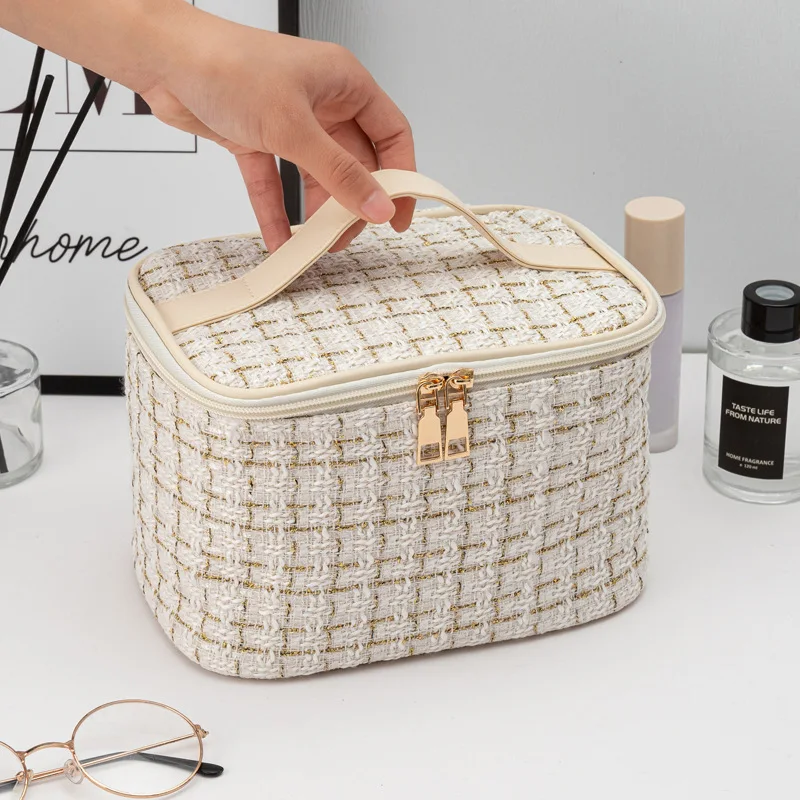Internet celebrity handheld makeup bag, large capacity Instagram style portable and high-value travel grooming storage bag