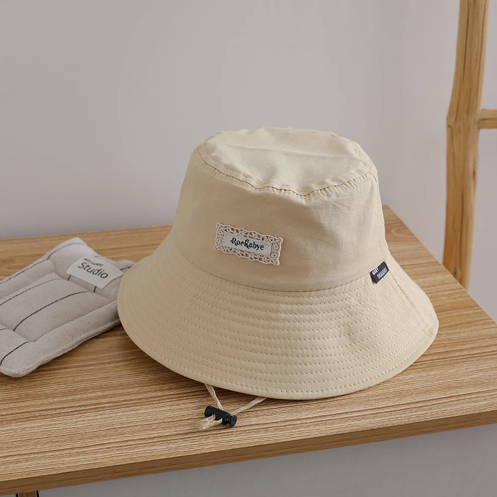 Children's hat with multi-color dopamine embroidery lace and lettering. Adjustable outdoor beach sunshade fisherman hat.