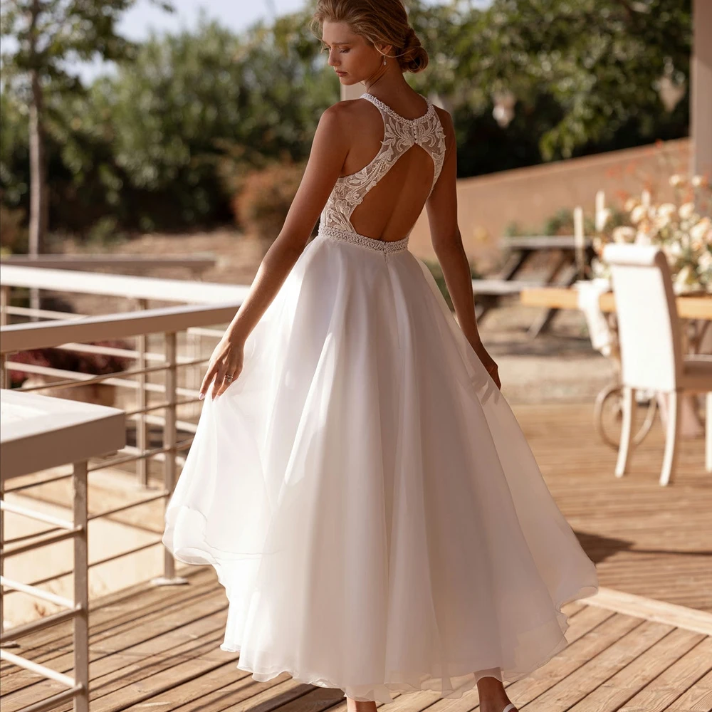 Customized Deep V Neck Wedding Dresses A Line Sleeveless Bridal Growns Applique Lace Button Back Tea Length Vestido de novia New