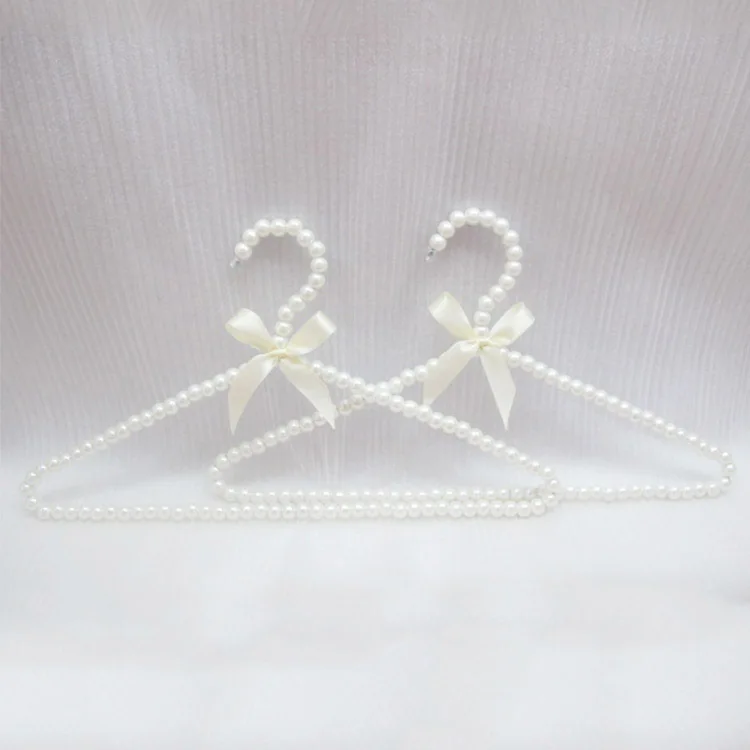 10pcs Drying Rack 40cm White Hangers For Clothes Pink Bowknot Pearl Plastic Hanger For Wedding Dress Coats Rock Home Accessories