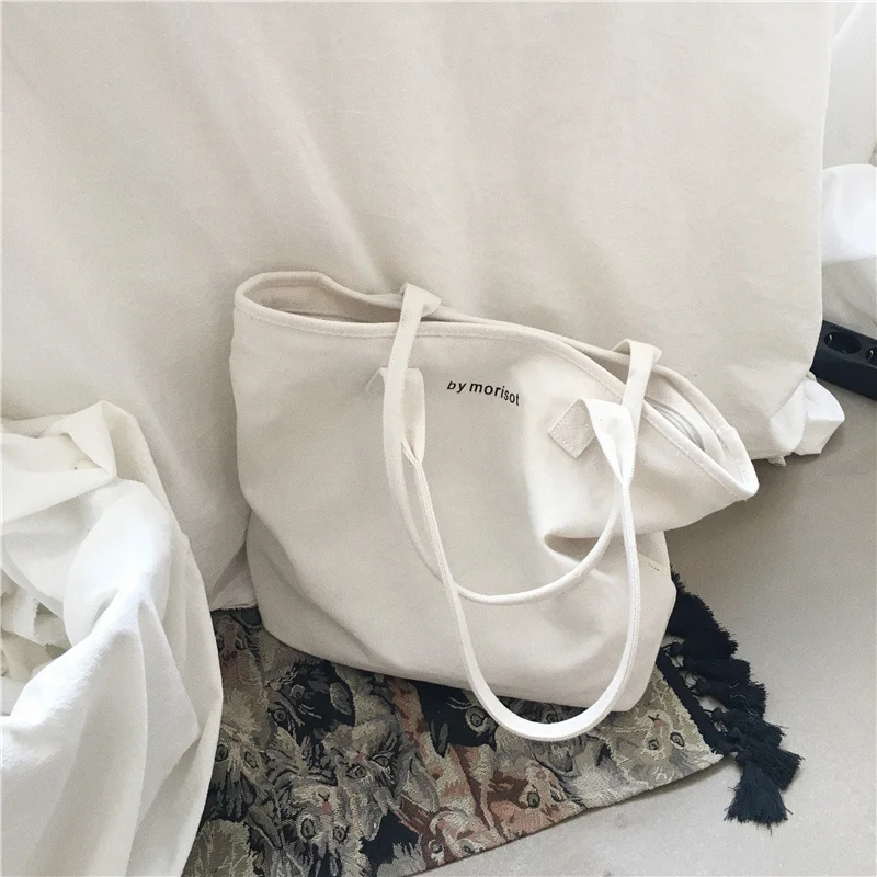 

2026 New Korean Style Large Capacity Canvas Bag Women's Single Shoulder Casual Artistic Handbag Student White Versatile Bag