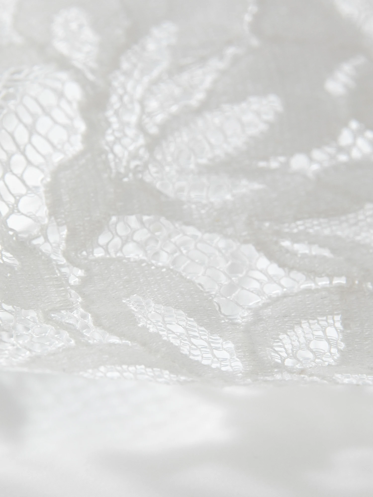 FSLE ภาษาฝรั่งเศสคํา Vintage Cut-out Lace Patchwork แขนกุดผู้หญิงฤดูร้อนใหม่ 2025 สไตล์รีสอร์ทชุดสีขาว 25FS12709