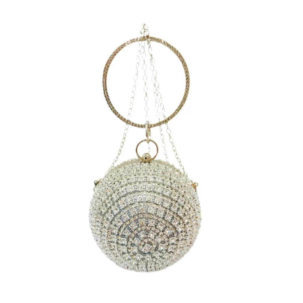 

A Fashionable, Versatile Round Silver Mini Bag For Banquets And Evenings. This Hand - Carry Dinner Bag Is A Trendy Choice