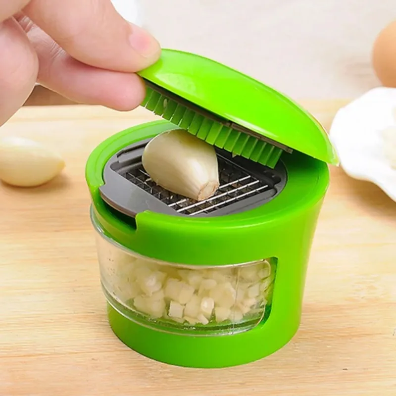 

Multi-functional Small Mini Garlic Cutter Creative Garlic Vegetable Cutter Kitchen Tool Garlic Puree Container Home Accessories