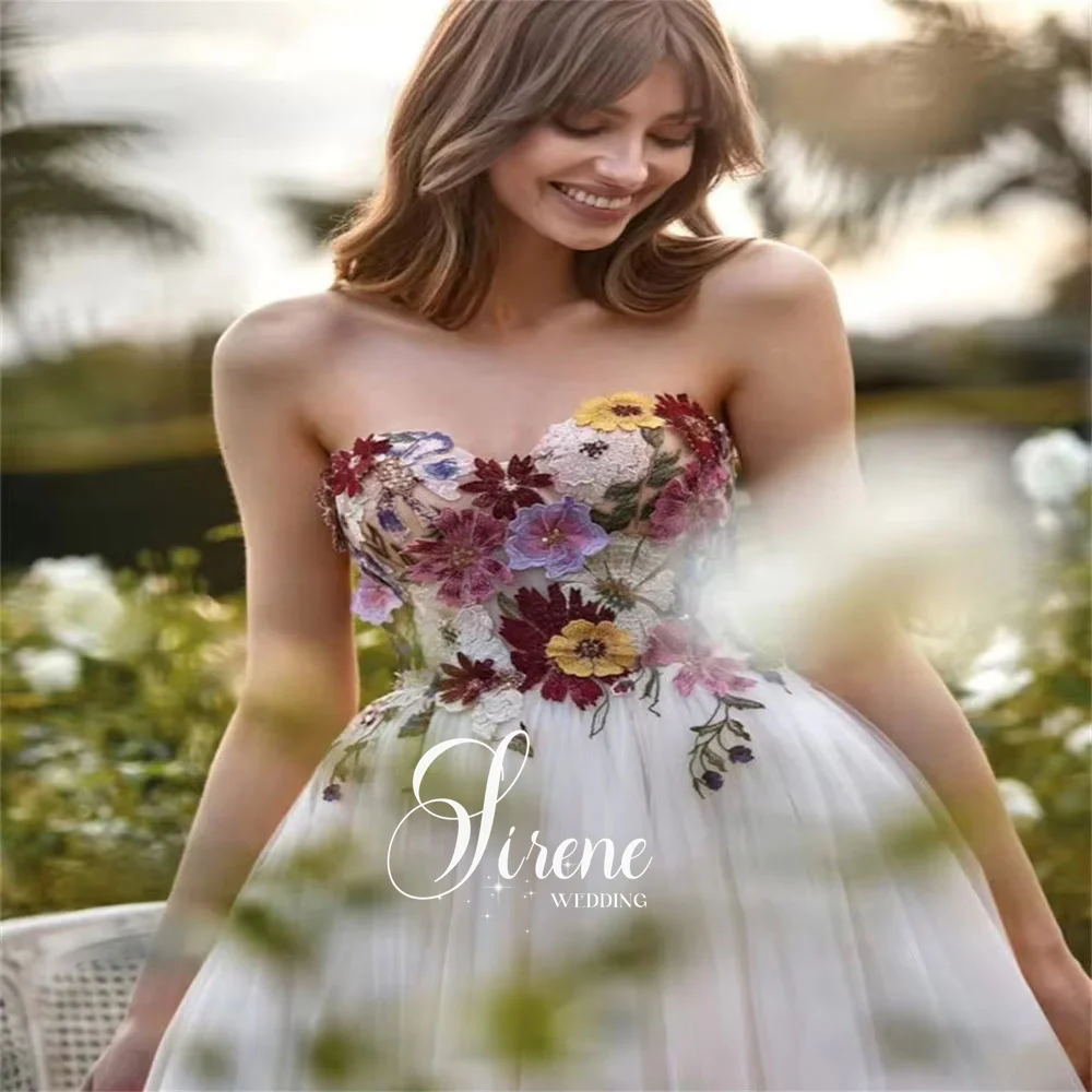 فساتين زفاف سيرين على شكل قلب بدون أكمام على شكل حرف a من التل والزهور بدون حمالات مزينة بطول الأرض بدون ظهر فستان حفلة موسيقية مخصص