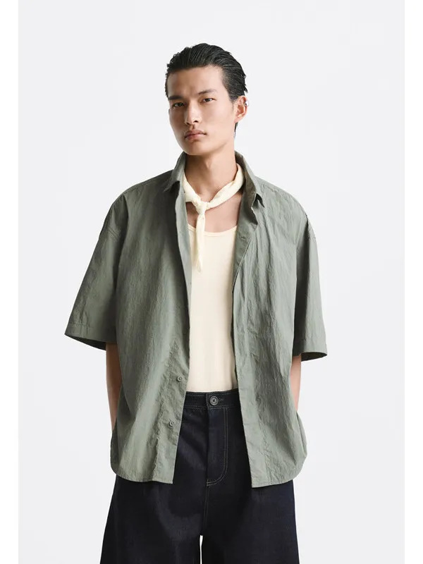 

Men's Casual Thin Tech Fabric Loose Short Sleeve Shirt Summer Cool Feeling Lightweight Fashionable Youth Popular Button up