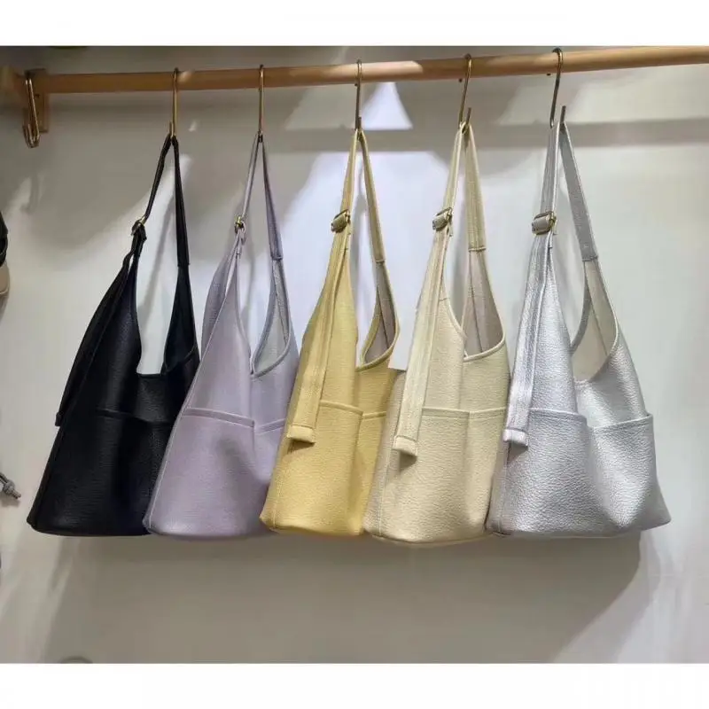 

French women's fashionable niche design new large capacity underarm bag student commuting soft leather shoulder tote bag