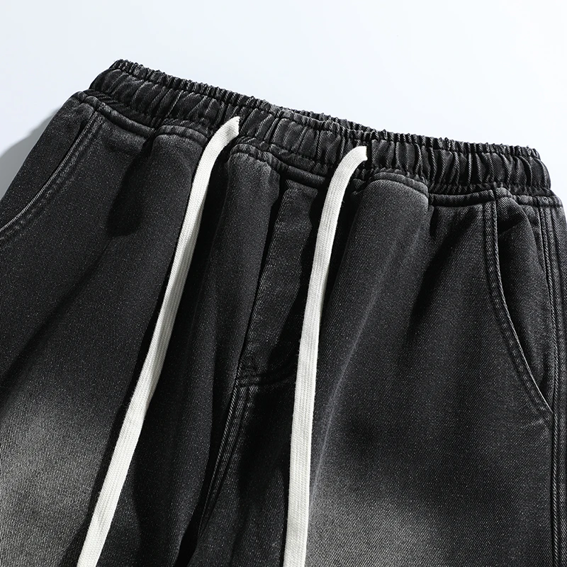 Jeans spessi invernali da uomo coreani Pantaloni larghi in pile dritti larghi da strada alla moda Pantaloni caldi in velluto con cinturino in vita elastico