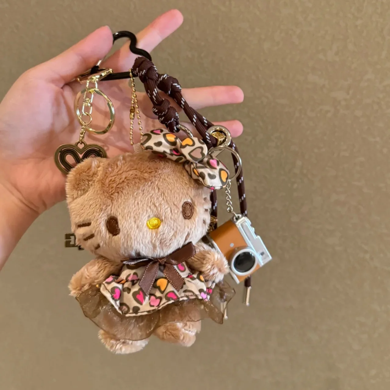 Sanrio Dark Skin Hello Kitty Leopard Print Dress Small Camera Heart Shaped Keychain Shoulder Bag Cartoon Pendant Festival Gift - view 2