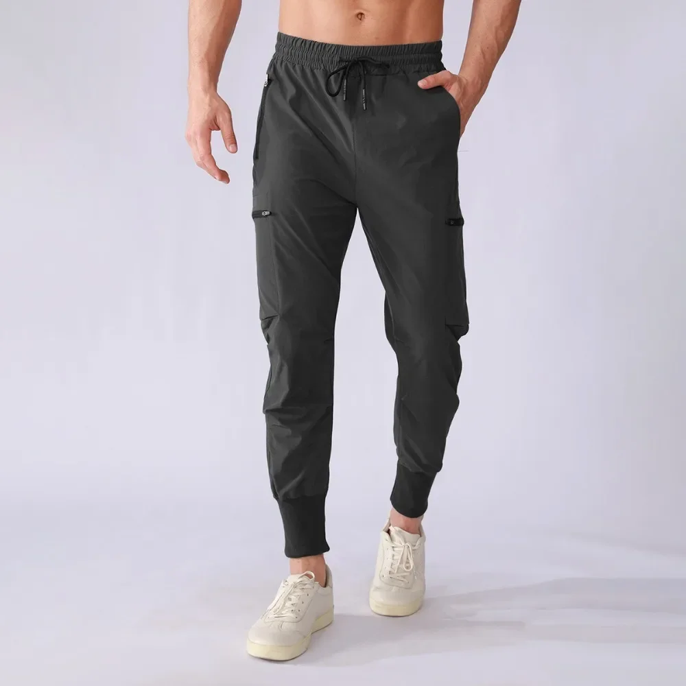 

Men's Quick-Dry Running Pants Stretch Woven Joggers with Drawstring Ankle and Pockets