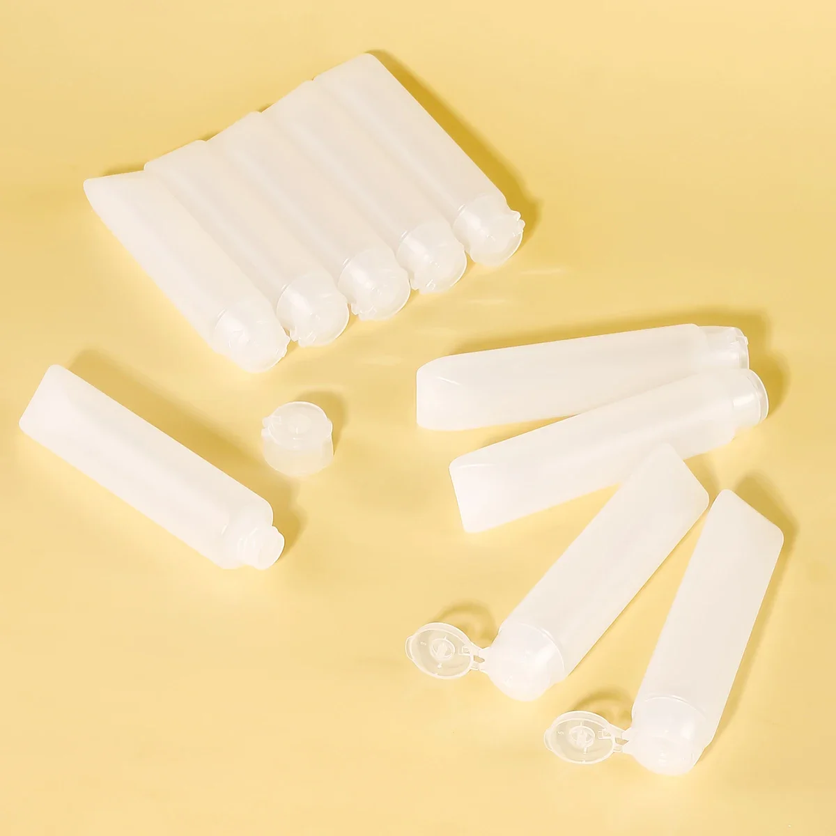 

10pcs 30/50ml Empty Refillable Plastic Soft Travel Squeeze Tube Bottles Translucent Cosmetic Containers with Flip Cover