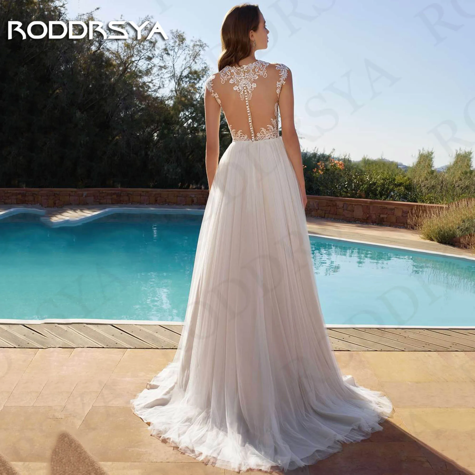 RODDRSYA Beach Illusion Back abito da sposa Sheer o-collo Appliques di pizzo Vintage abiti da sposa senza maniche una linea Spiaggia Illusione indietro Abito da sposa velato O-Neck  Abiti da sposa vintage in pizzo con