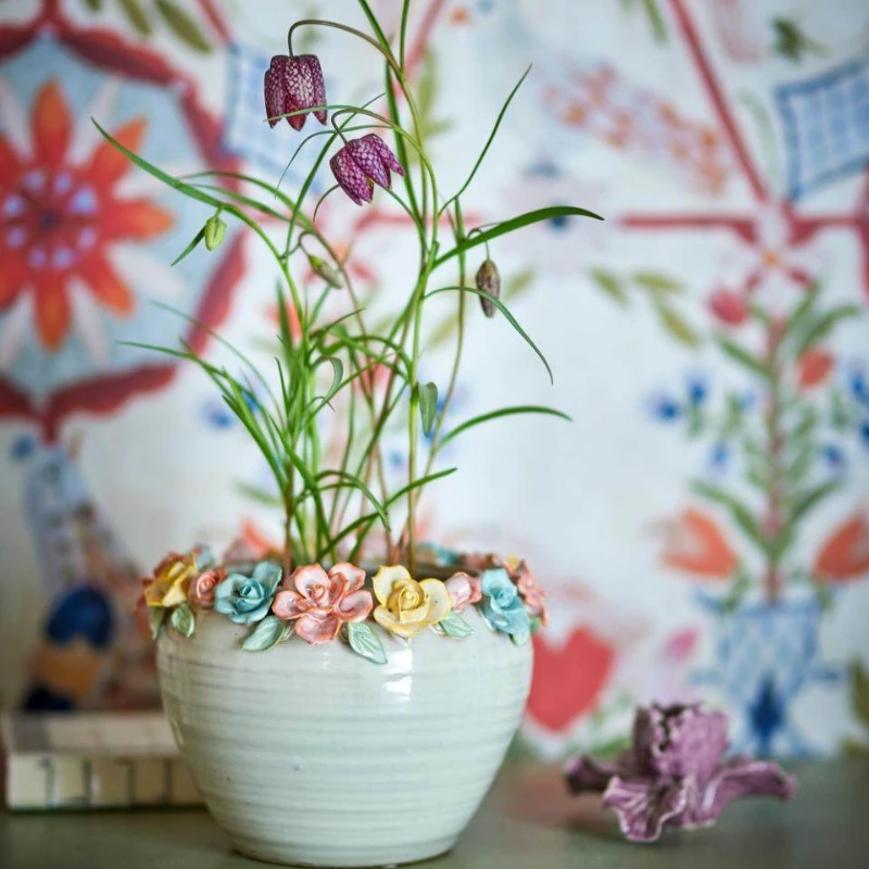 Handmade pottery engraved floral border vase