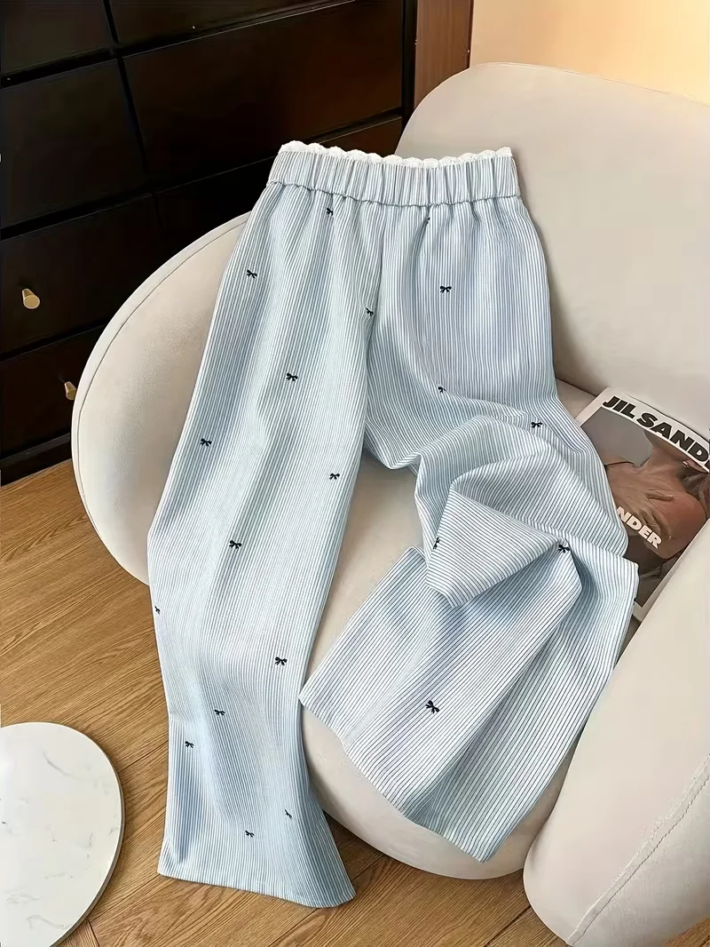 Damesbroek met wijde pijpen, strikaccent en gestreept - Kanten lambrisering, loszittende lange broek,