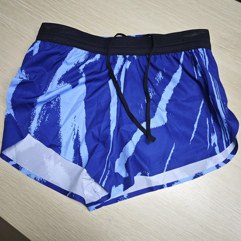 ..Sports running training quick-drying pressed rubber shorts summer sports three-point pants lined with zipper fanny packYYS61