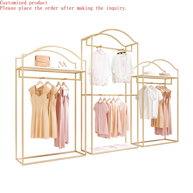 

Custom.Stainless Steel Hanger Rack Heavy Duty Modern Gold Clothes Store Display Rack Free Standing Garment Rack