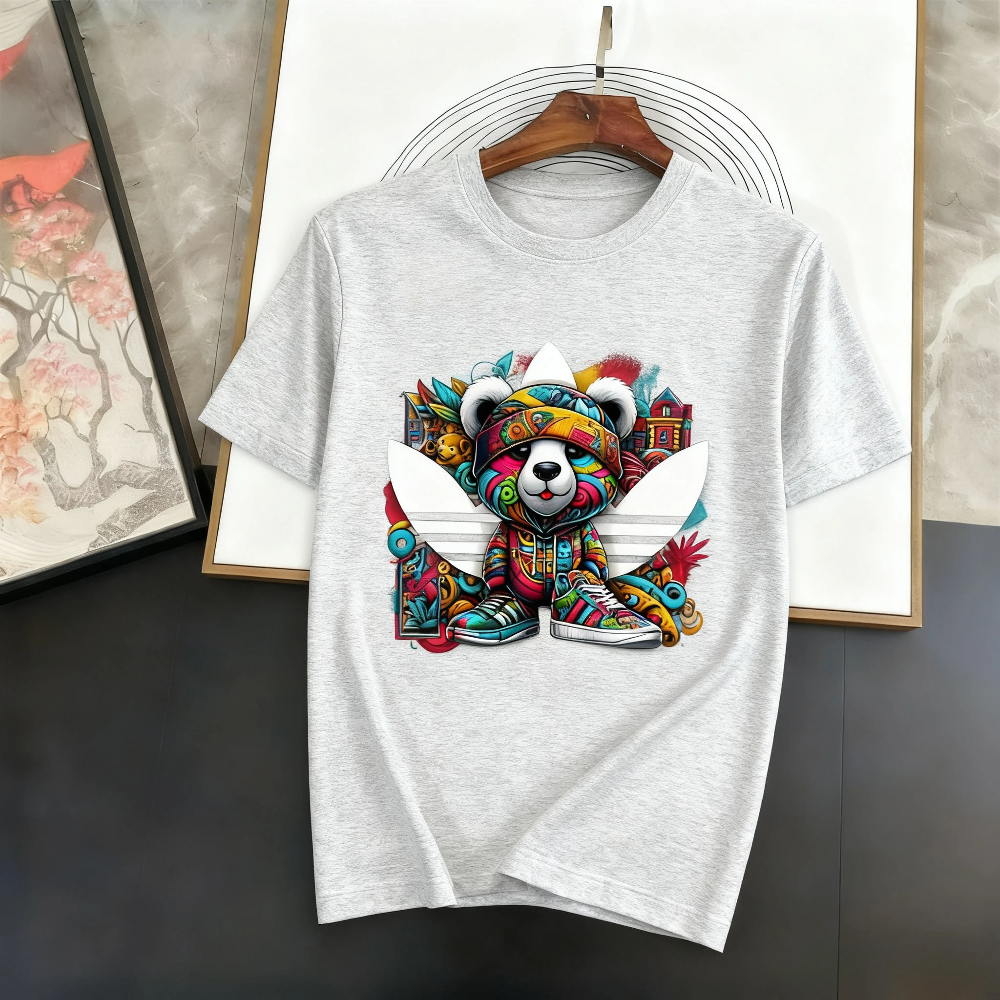 تي شيرت فضفاض متعدد الأغراض مطبوع منقوش من القطن الخالص 2025 صيف جديد بياقة بحار بأكمام قصيرة للرجال والنساء