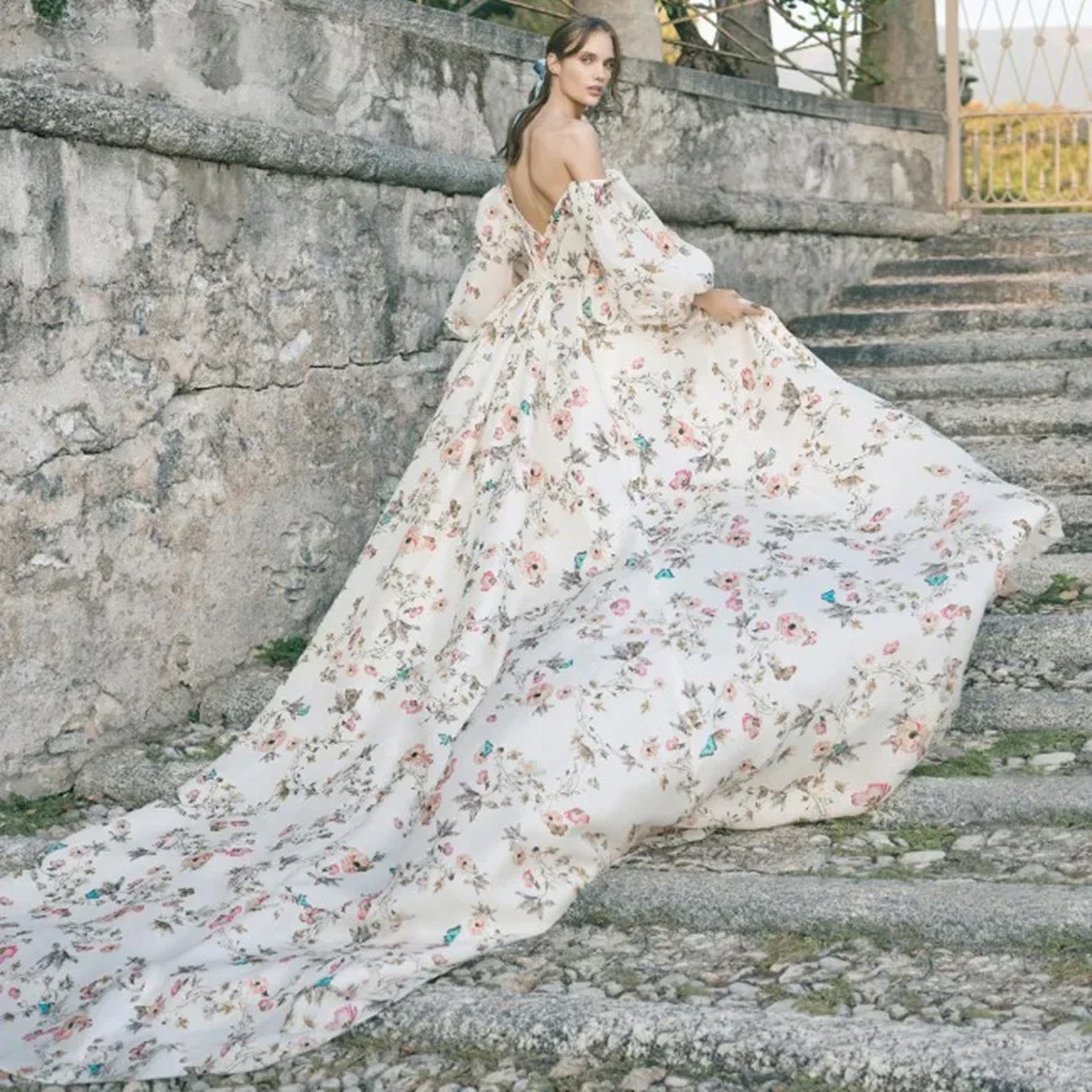 

Stunning Floral Print A Line Evening Dresses 2023 Elegant Puffy Sleeves and Flowing Train Perfect for Wedding and evening dress.