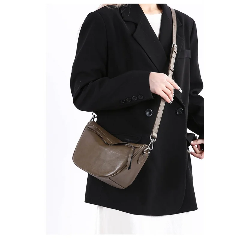

Sophisticated Dome Shape Bag For Ladies With Curved Top And Structured Luxury Leather