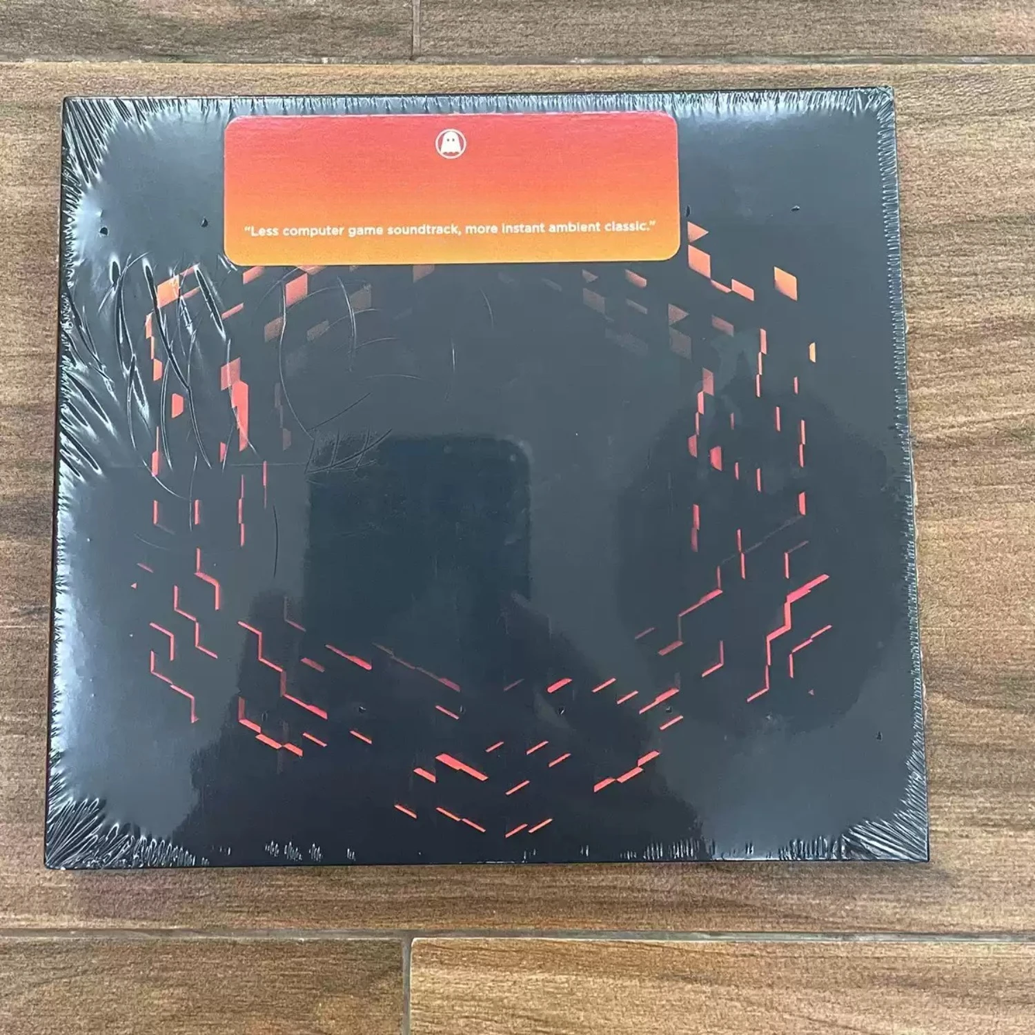 

Minimalist Ambient Electronic CD with Pixelated Red Block Print, Immersive Soundscapes, Ideal for Video Game Music Admirers