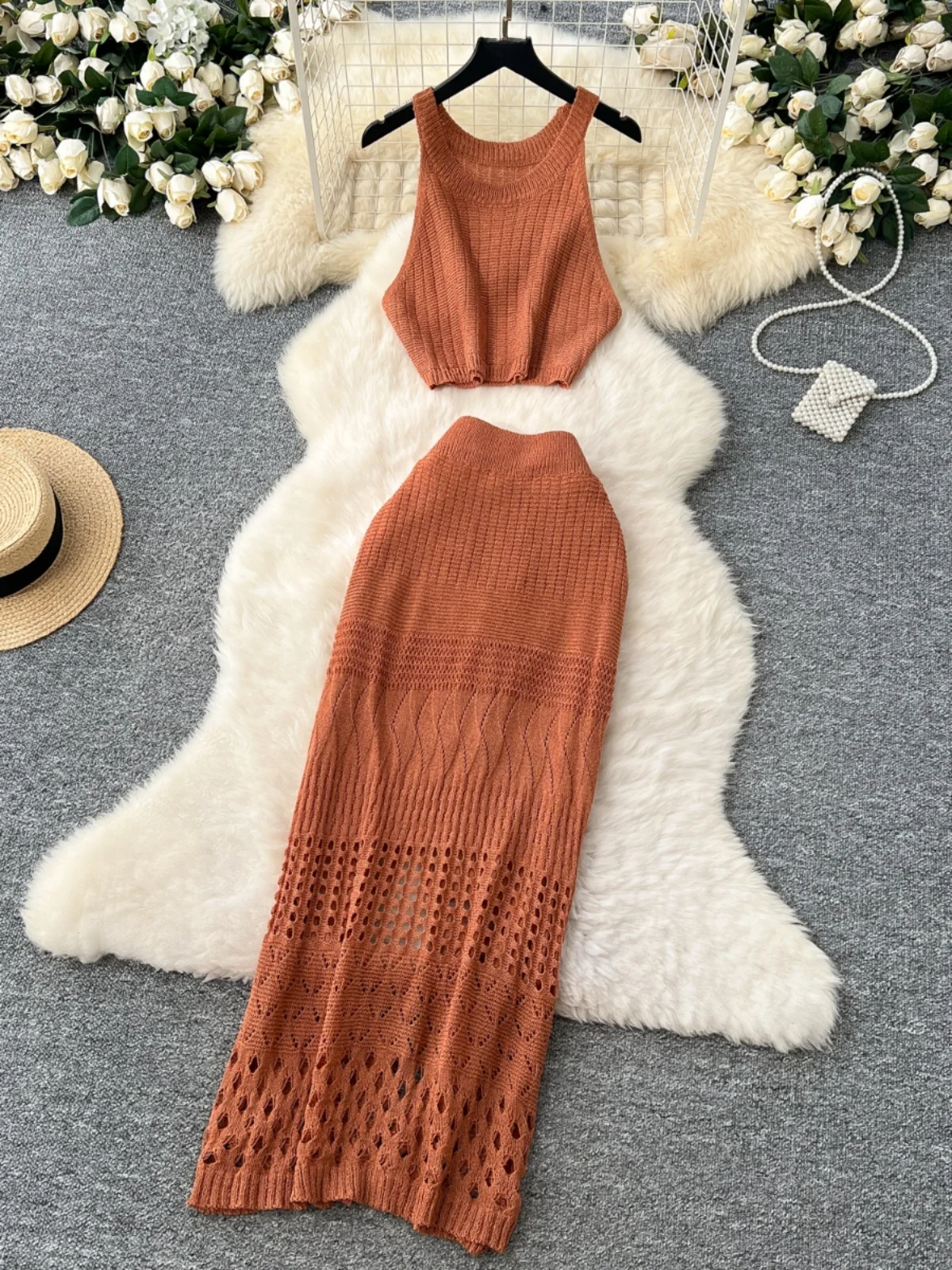 Conjunto de moda de primavera para mujer estilo coreano: ceco sin mangas de punto con cuello hueco y falda de cintura alta...