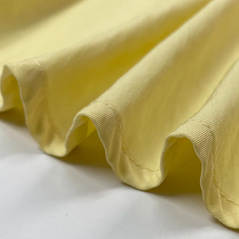 فساتين حفلات صفراء أنيقة ذات ياقة طية صدر السترة فساتين متوسطة الطول موضة فضفاضة بأزرار مطوي بلون سادة فستان قميص نسائي غير رسمي