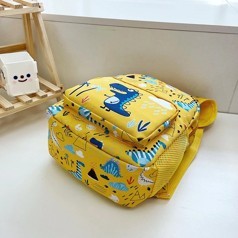 Mochila de dinosaurio para niños, morral escolar de dibujos animados, 5 colores