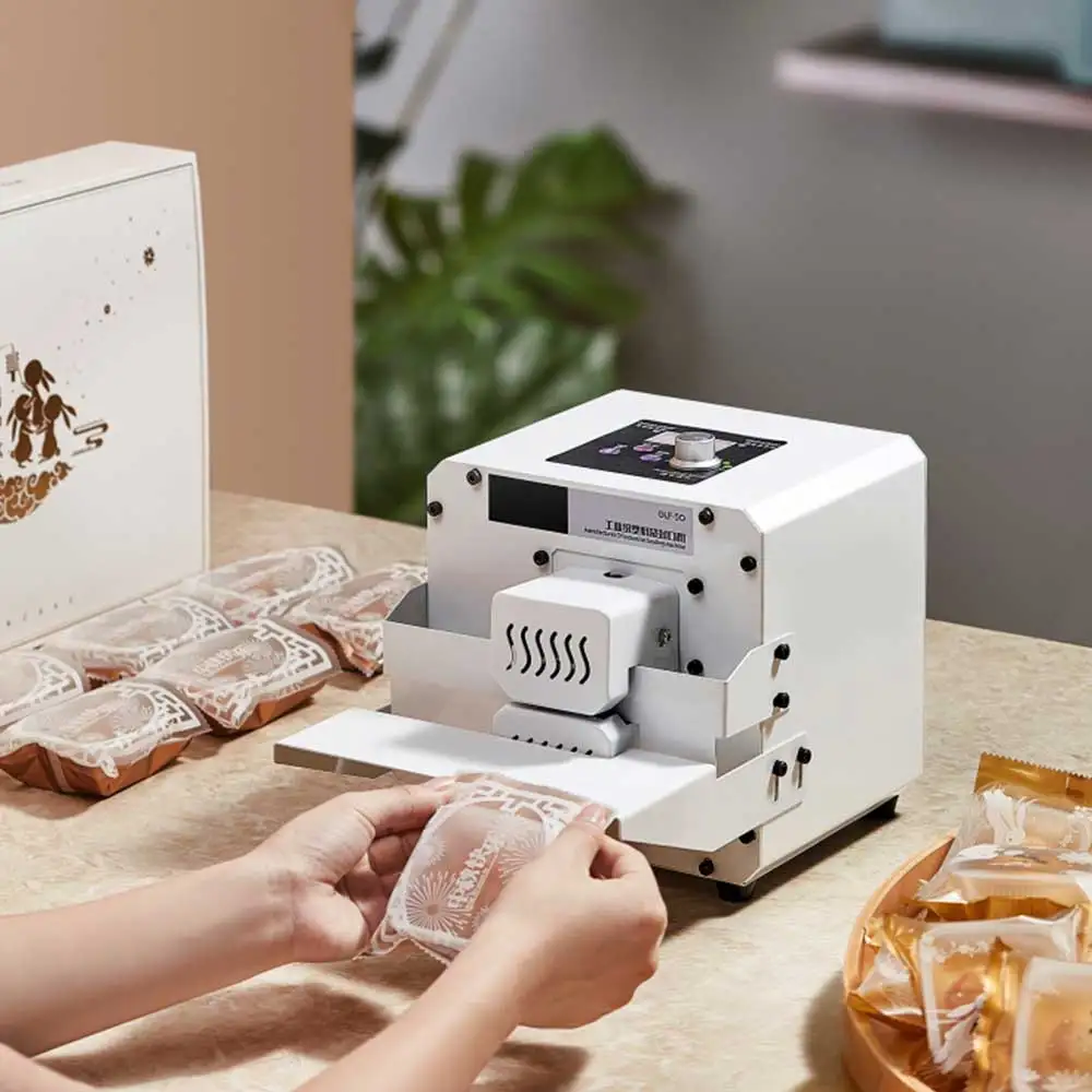 Sigillatrice per alimenti in sacchetto di plastica sigillatrice per sacchetti di Mooncake completamente automatica commerciale piccola termosaldatura