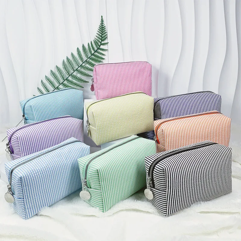 

New foam gauze makeup bag, printed with a handle and large capacity for washing, embroidered striped travel storage bag