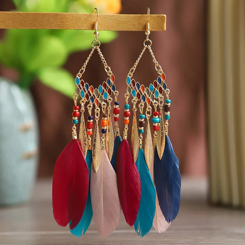 Boucles d'oreilles pendantes bohèmes ethniques pour femmes, pendentifs en plumes, perles colorées, pompons longs, bijoux bohèmes pour filles