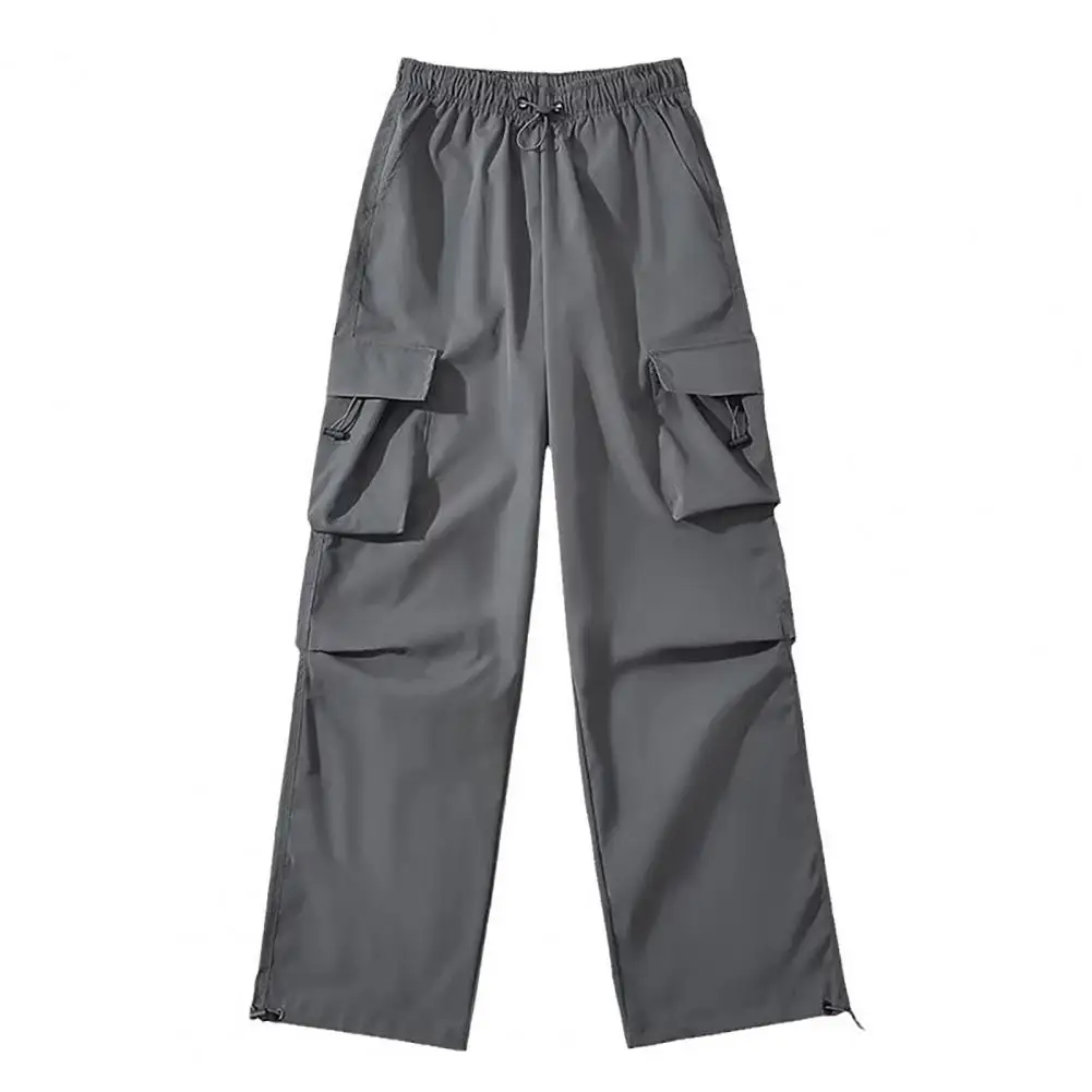 Pantaloni a gamba larga in tinta unita pantaloni Cargo da donna a vita alta con cinturino elastico regolabile Design Multi-tasca per Jogging