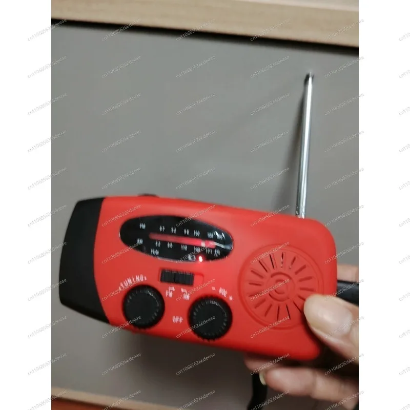FM multi-function flashlight disaster prevention solar emergency radio hand crank power generation