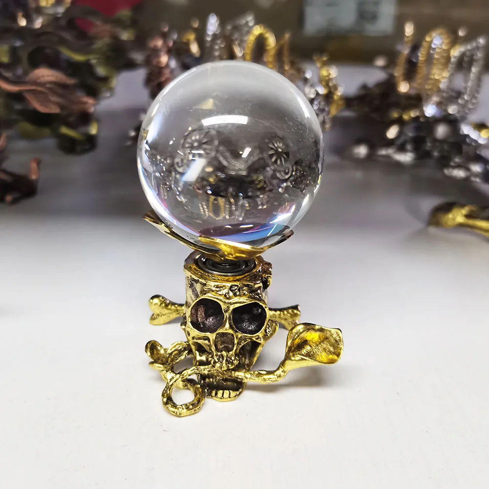 

Golden Revolve Skull Metal Crystal Base Sphere Holder Desk Decoration Room Handicraft Decor Wholesale