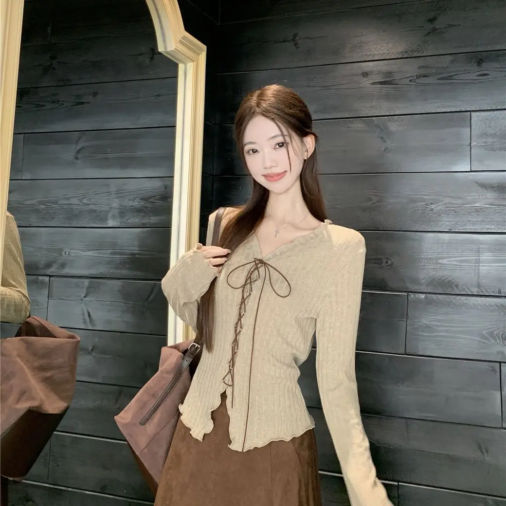 V-neck Lace-up Fungus Edge Long-sleeved Knitted Sweater 2026 Autumn Fashion