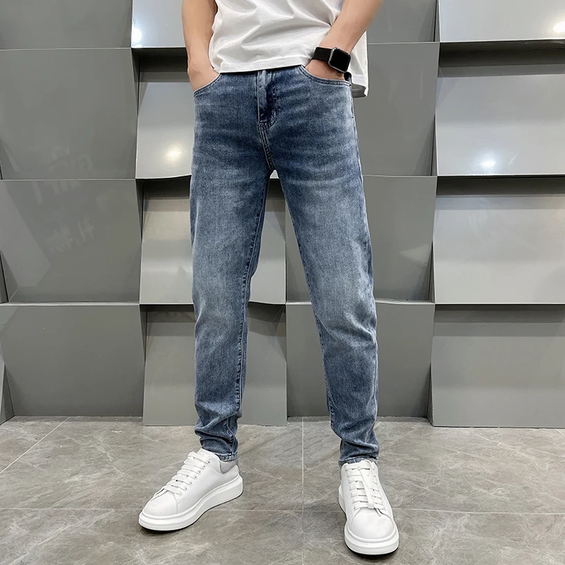 High-end light luxury printing men\'s jeans loose straight pants spring and summer models casual versatile light blue men\'s pants