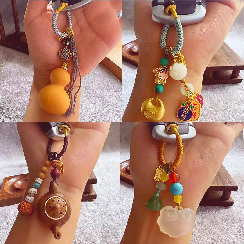 porte-cles-thangka-fait-main-pendentif-creatif-cinq-voies-du-dieu-de-la-richesse-accessoire-de-cle-de-voiture-cadeaux