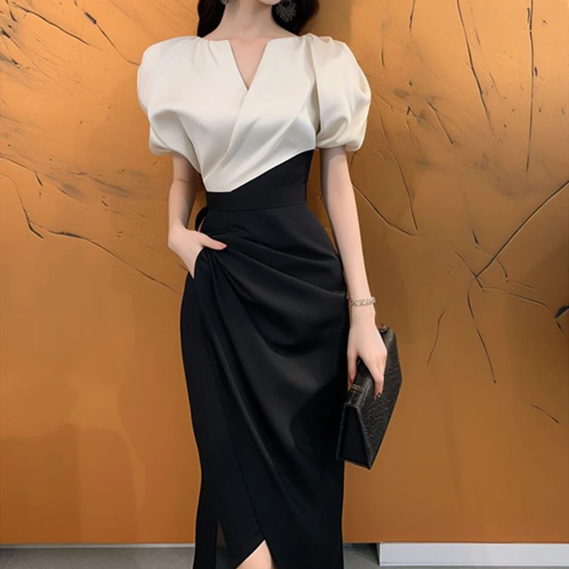 Robe à col en V assortie aux couleurs noires et blanches, sens du design de tempérament français, robe audio littéraire exquise, été 600