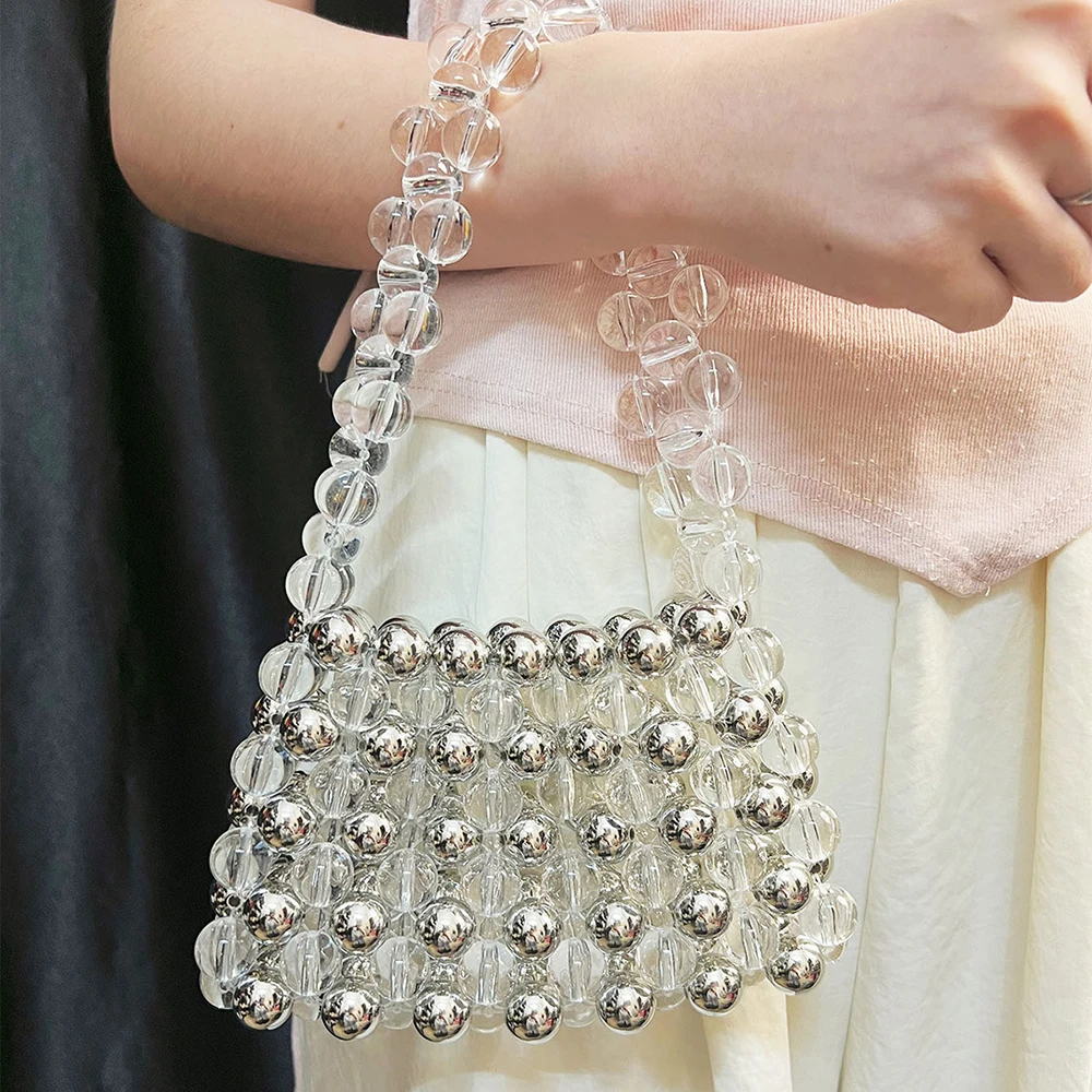 مطرز حقيبة من القماش المرأة 2025 صيف جديد الفرنسية كسول نمط شيك تصميم فضي شفاف الطازجة الحلو الاكريليك حقيبة يد الإناث