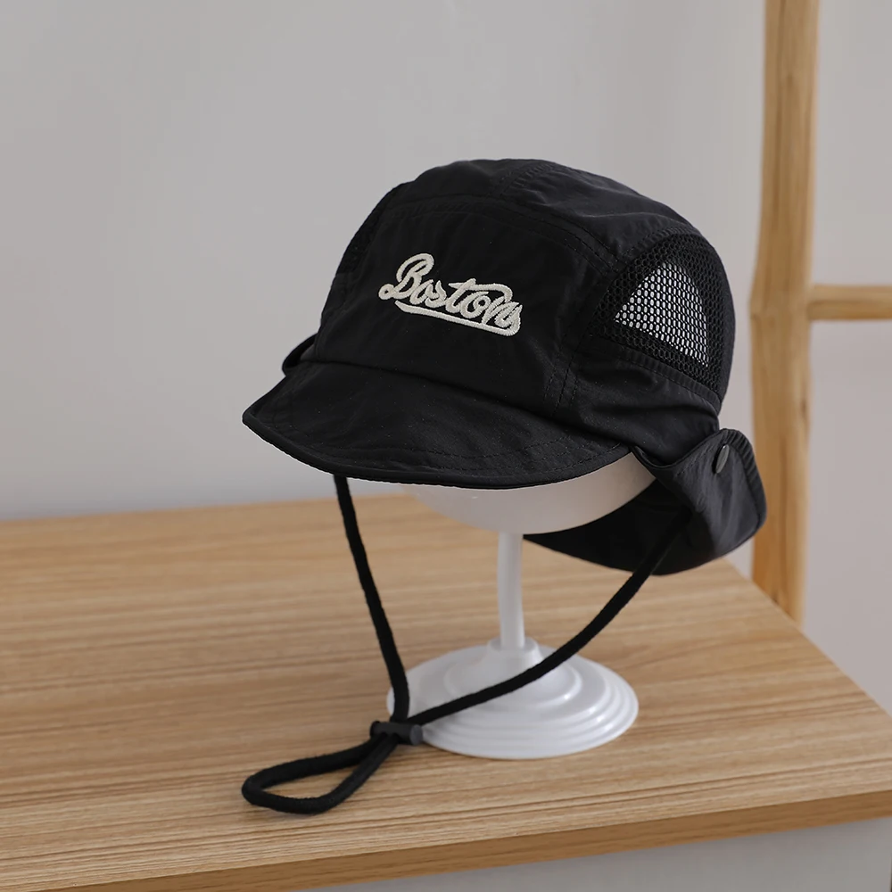 

Children's hat with simple embroidered letters "BO". Two-sided net cape with hole and flange edge and rope. Fisherman hat.
