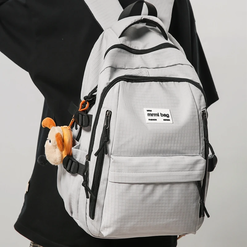 Nova moda feminina dos homens de alta capacidade à prova dwaterproof água faculdade mochila na moda feminina portátil sacos escolares bonito menina viagem saco livro legal