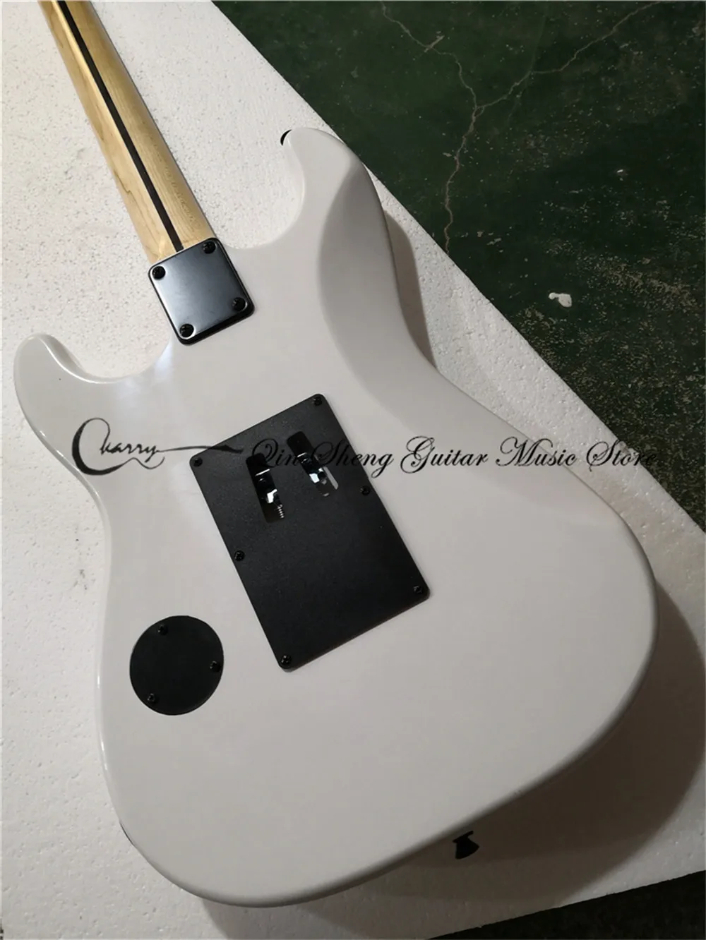 Char white guitar, 6-string electric guitar, black tremolo bridge, white pickups, white head