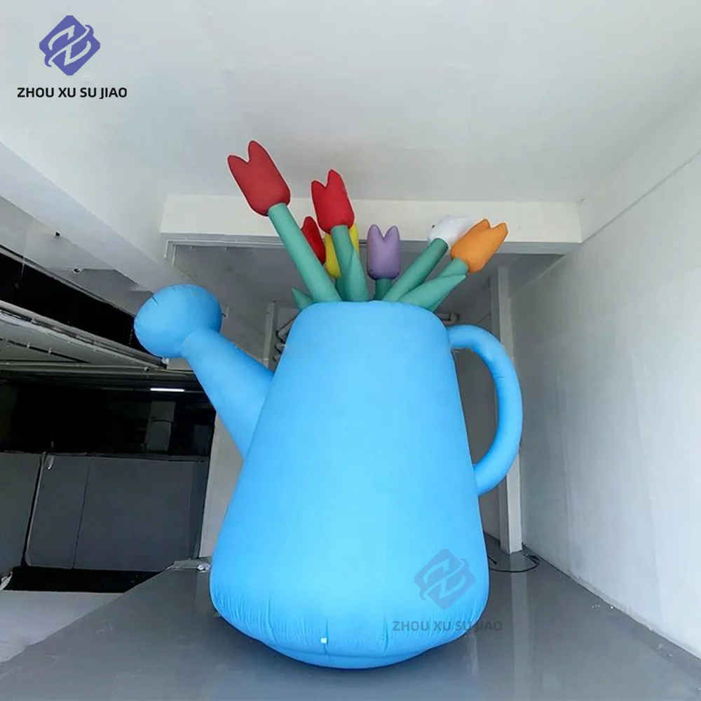 

Inflatable Watering Can with Flowers, Showcasing The Spring Activities at the Outdoor Shopping Center, And Spring-Themed Props.