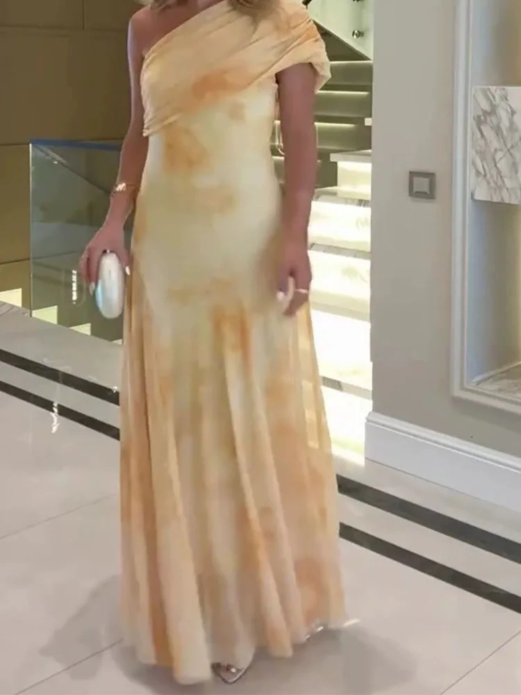 女性用エレガントなハイウエストドレープロングドレス、ファッショナブルな柄プリント、バックレススリムドレス、セクシーな斜め肩ノースリーブボヘミアン風ドレス